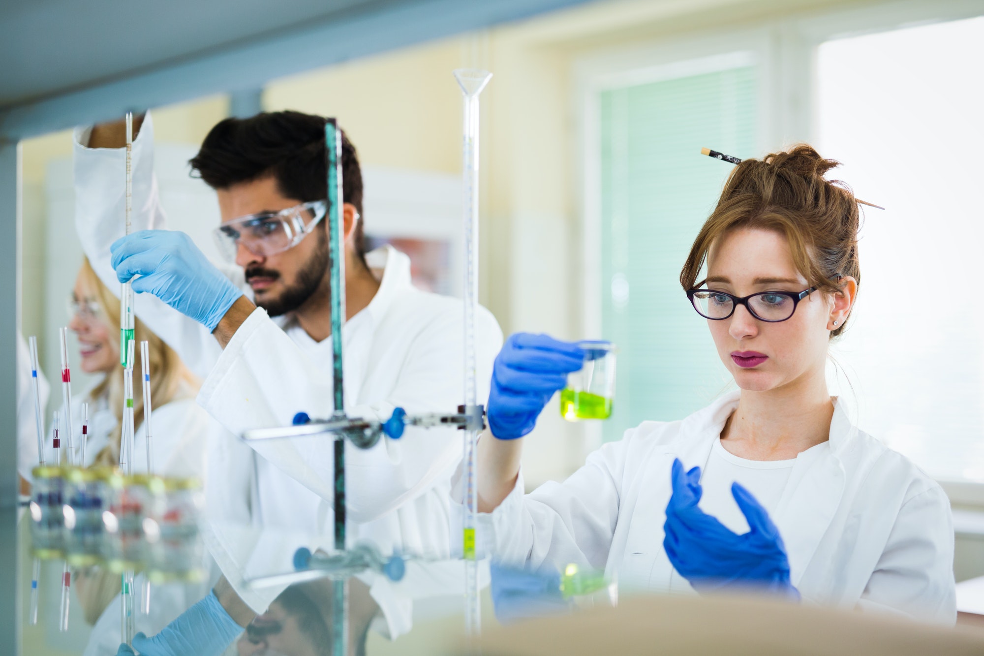 expert looking at samples